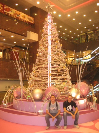 Adam & Chris beneath a Christmas tree, Hong Kong